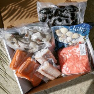 Frozen shrimp, clams, mussels, poke tuna, salmon and mahi portions